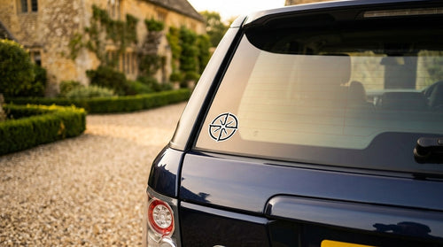 Belgian Warmblood registry vinyl sticker on a navy Range Rover Sport outside an English country estate, warmblood breed sticker decal