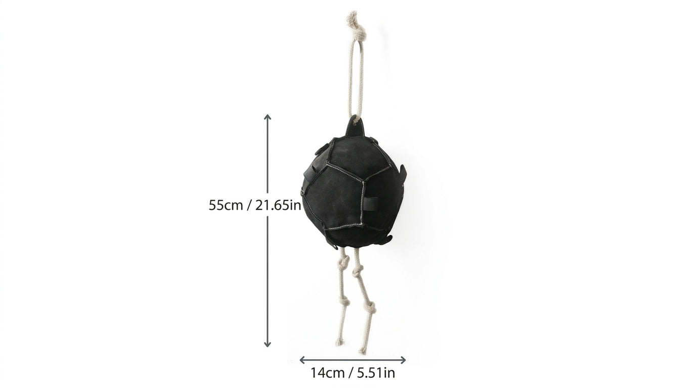 Black geometric hanging toy with measurements on a white background