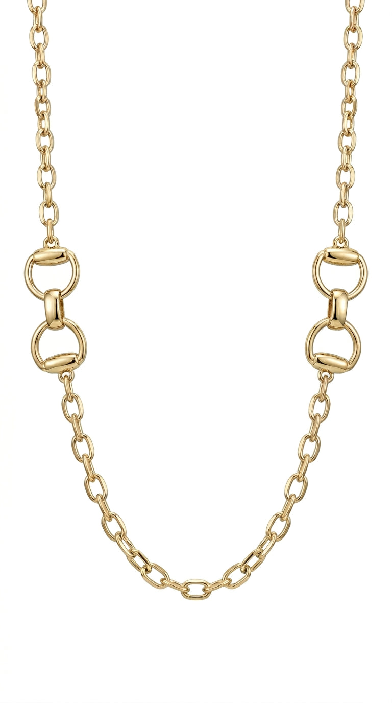 Gold chain necklace on a white background