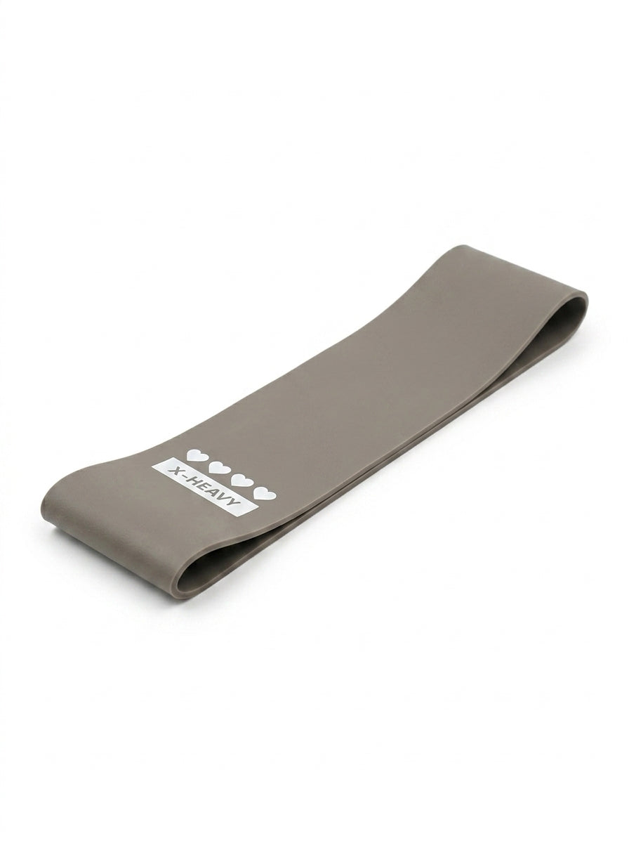 Gray resistance band with 'X-Heavy' label on a white background