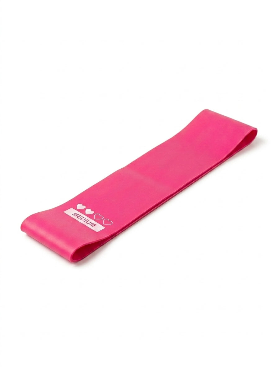 Pink resistance band with a label on a white background