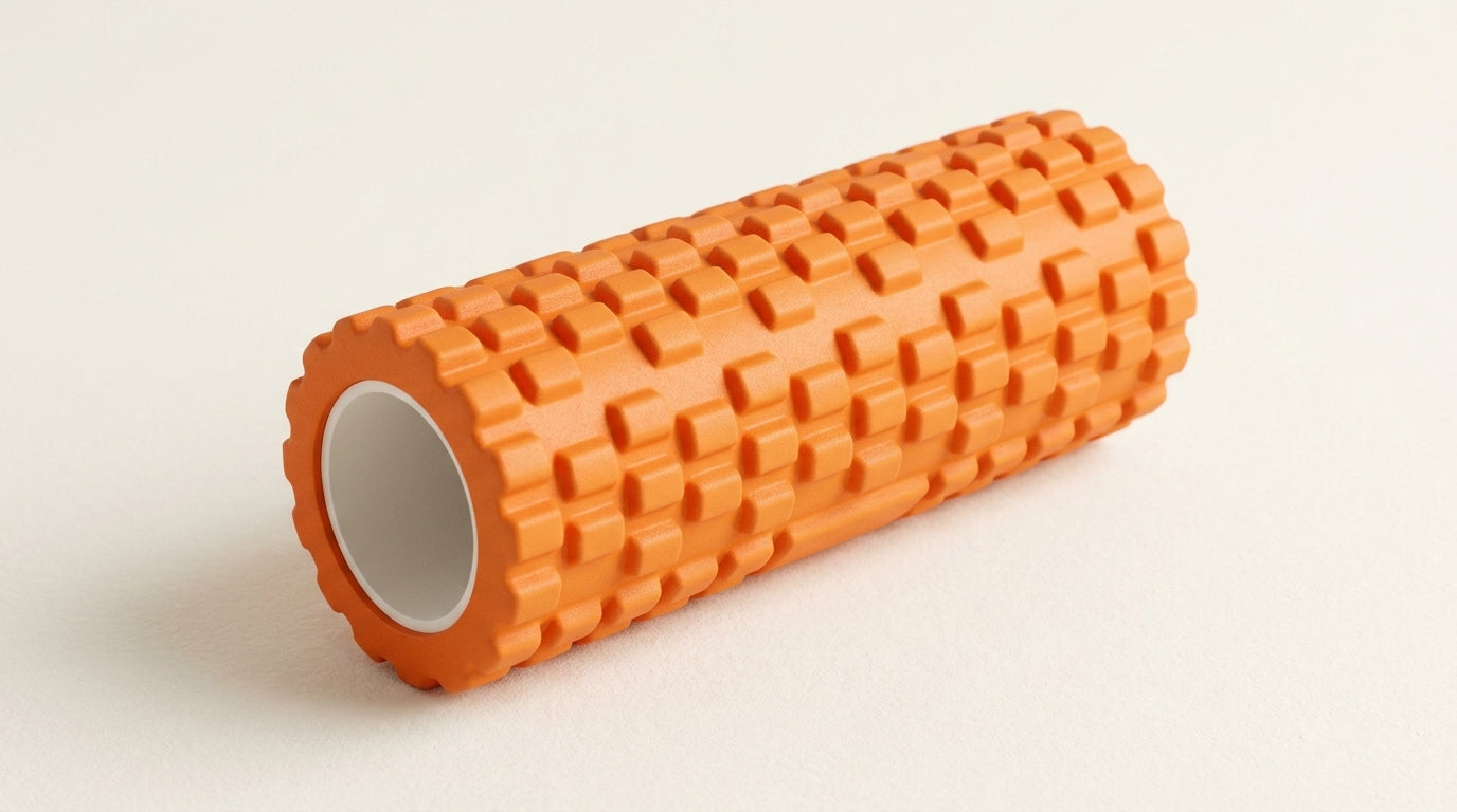 Orange textured foam roller on a neutral background — Notting Hill Equine Rider Fitness