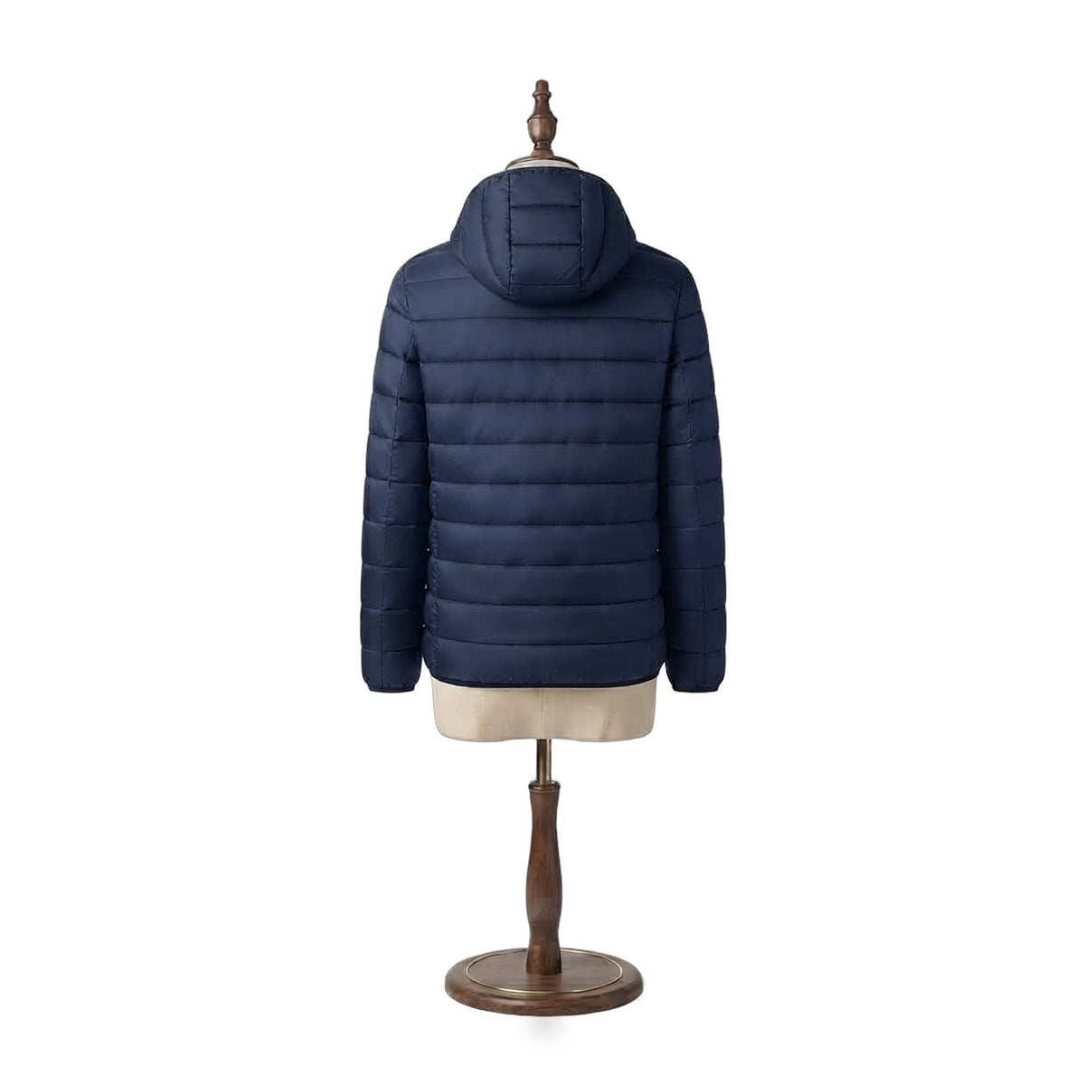 The Barn Heated Jacket in Dusk navy, back view showing hood and quilting on a beige dress form