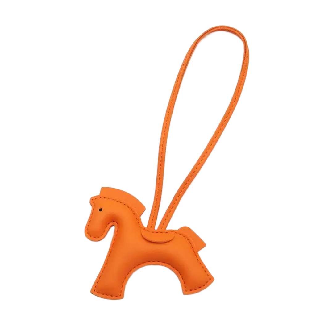 NHE leather pony keychain pendant in orange colorway, equestrian bag charm for hunter jumper riders