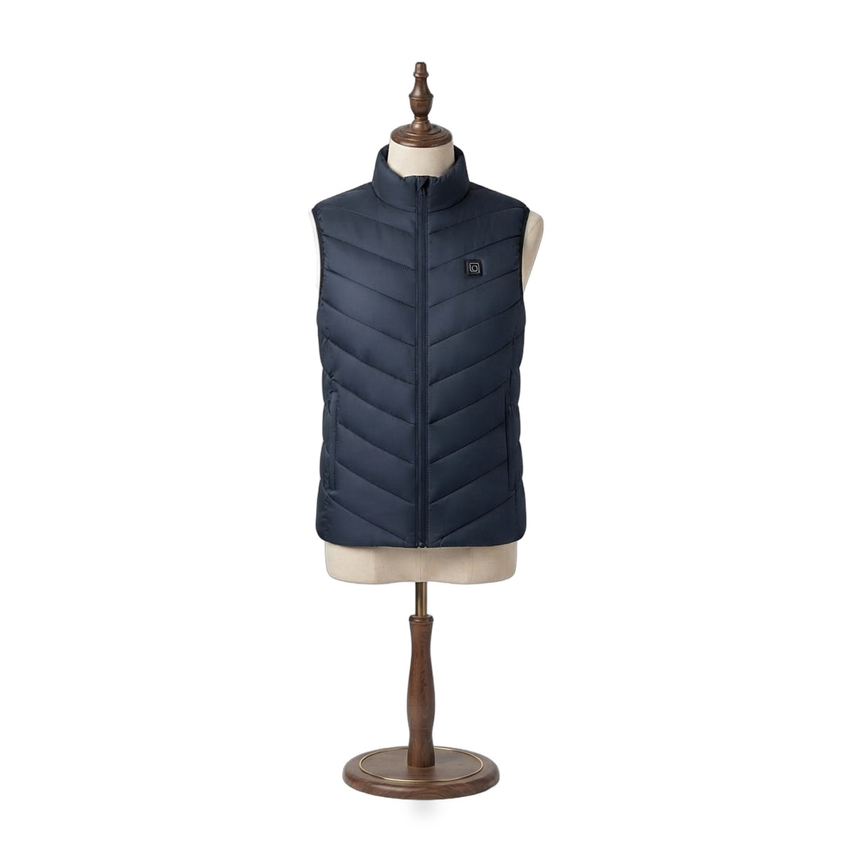 The Warm Up Heated Vest in Dusk navy with chevron quilting, front view on a beige dress form — Notting Hill Equine