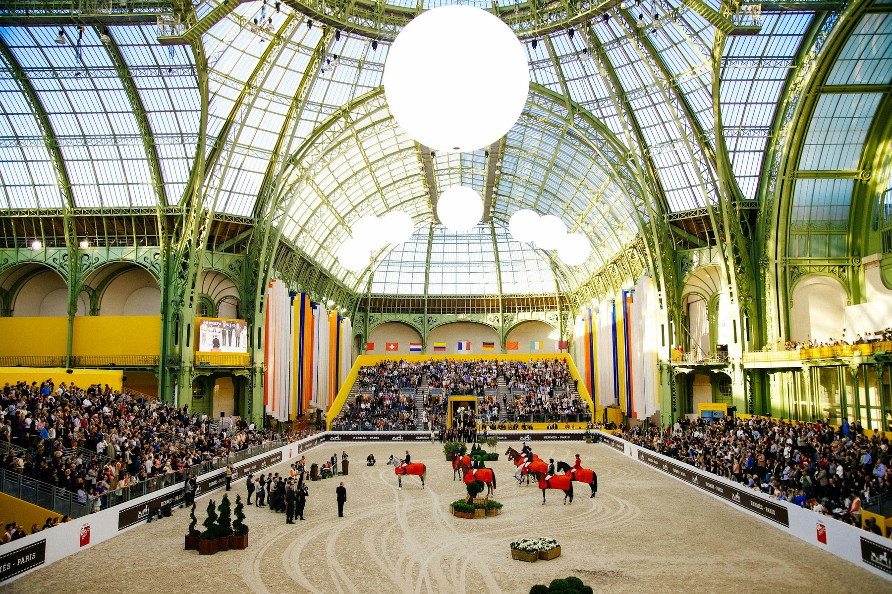 Grand Prix show jumping competition inside the Grand Palais in Paris with a packed crowd — Notting Hill Equine